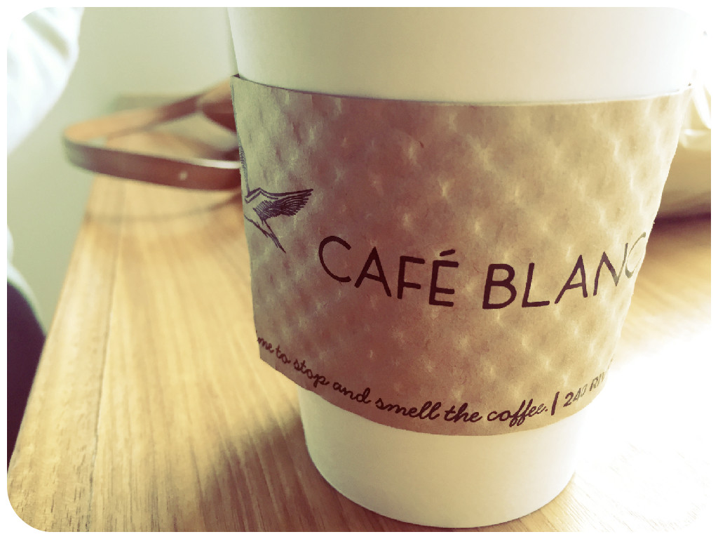 Enjoy a cup of coffee at Café Blanca.