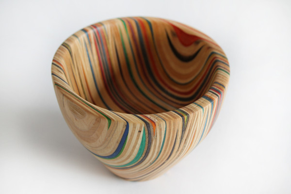 Many of the items from AdrianMartinus are made from reclaimed items like the colored layers from skateboards that make up this bowl.