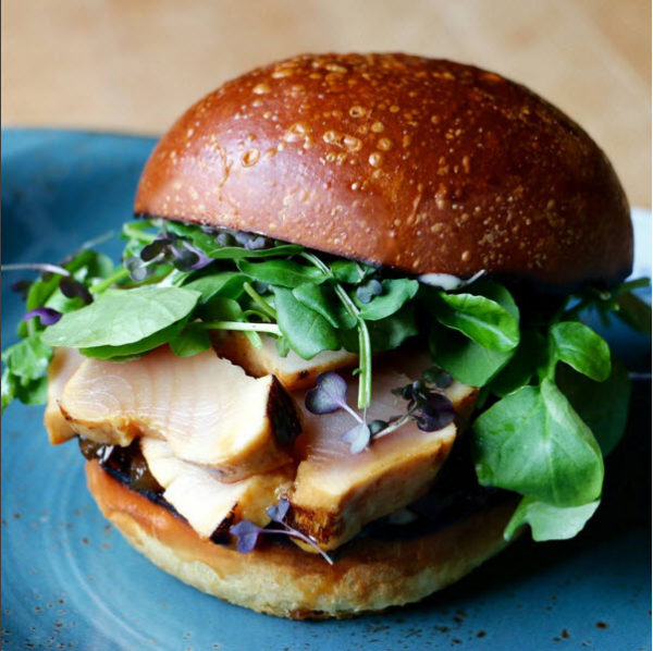 Grilled albacore tuna burger, ginger glaze, jalapeño & apple chutney, yuzu aioli, peppery greens.