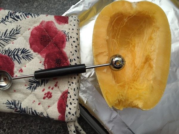 Clean out seeds spaghetti squash