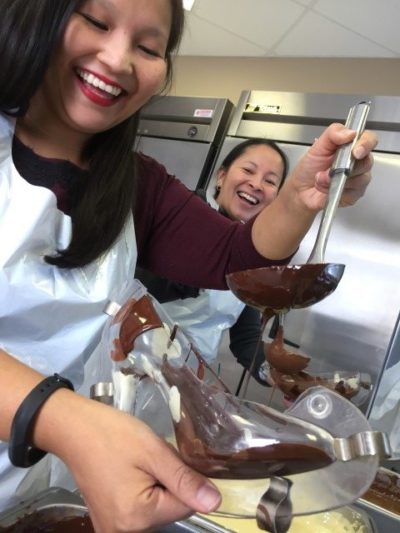 Filling chocolate shoe at Chocolaterie Bernard Callebaut