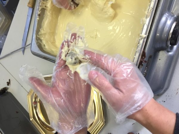 Coating truffles at Bernard Callebaut.